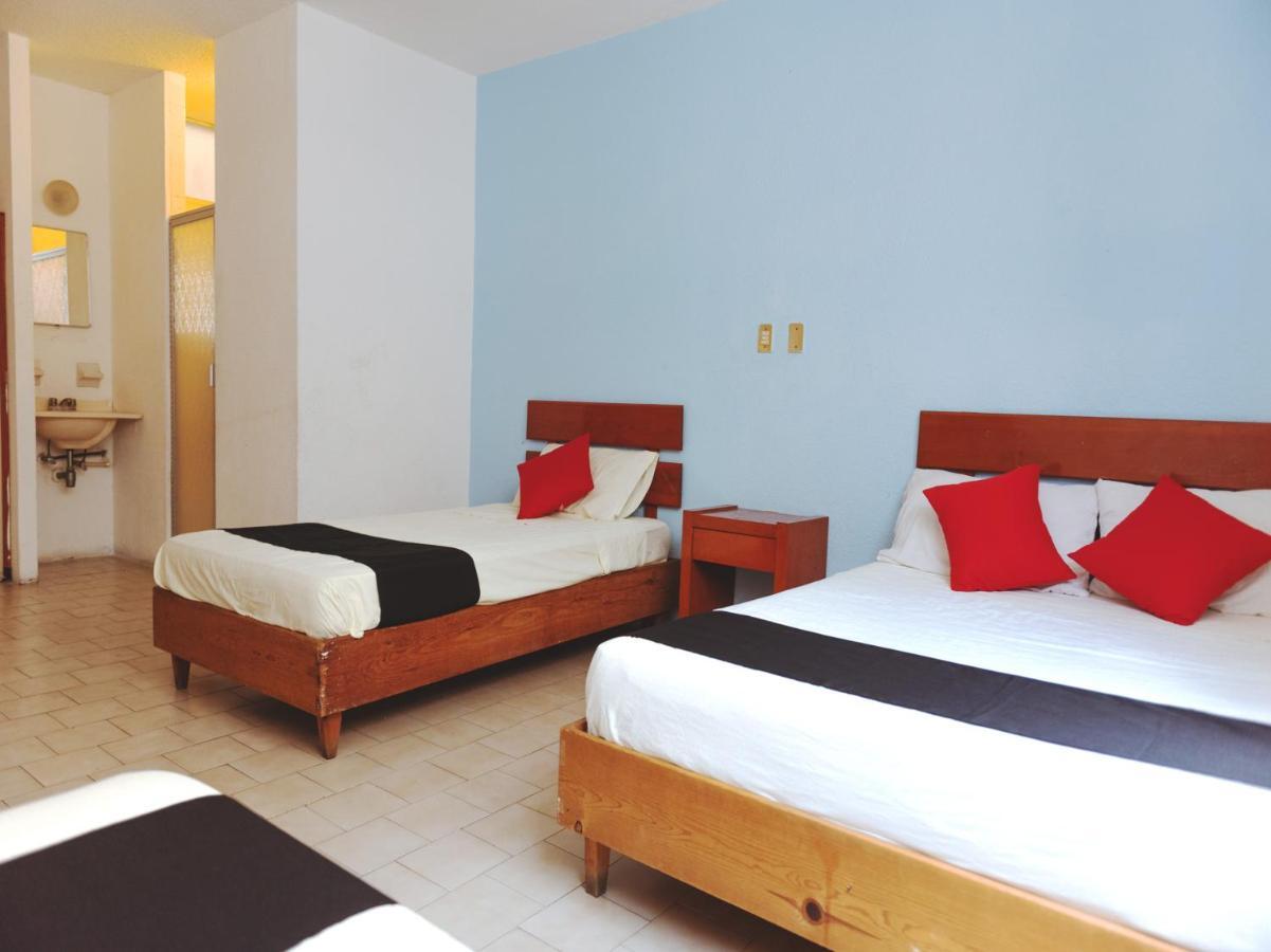 Oyo Hotel Italia อากวสคาเลียนเทส ภายนอก รูปภาพ