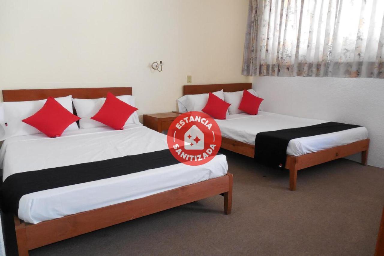 Oyo Hotel Italia อากวสคาเลียนเทส ภายนอก รูปภาพ